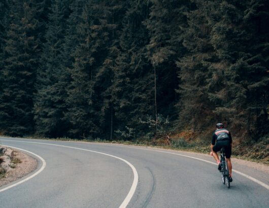 The image of the bike rider in the mountains